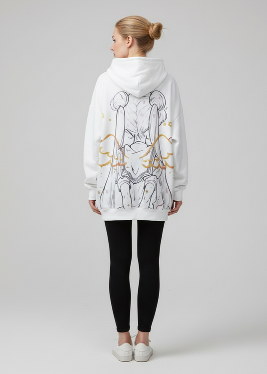 Person wearing a white hoodie with artistic design on the back, standing against a plain background