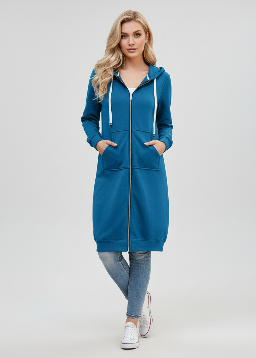 Woman wearing a blue hooded dress with a white background